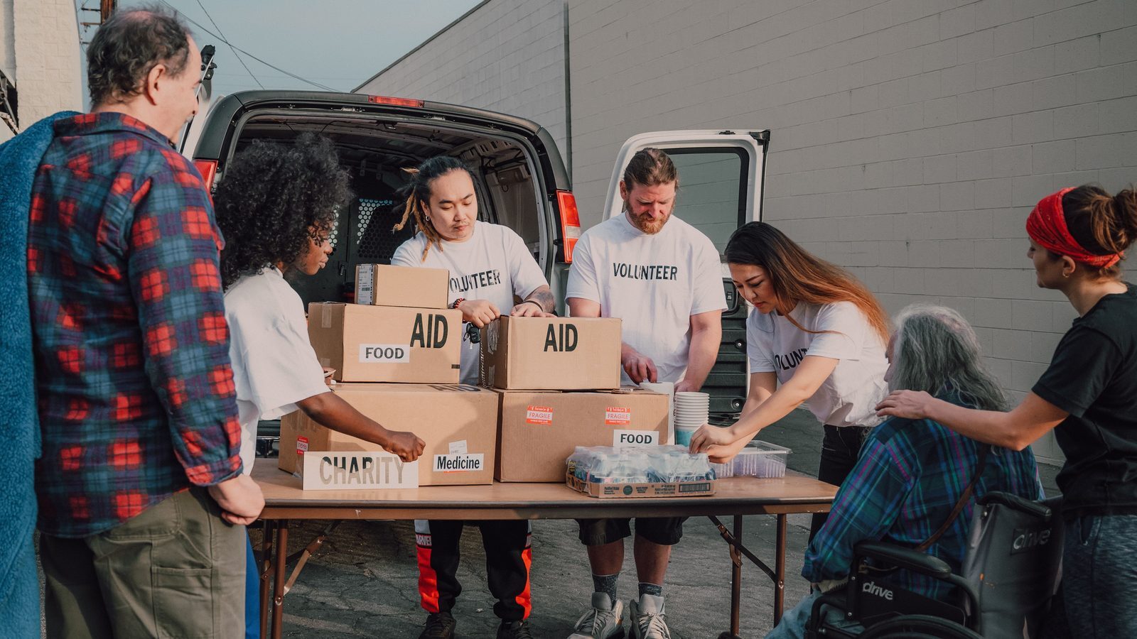 Volunteers packing supplies for a community programme