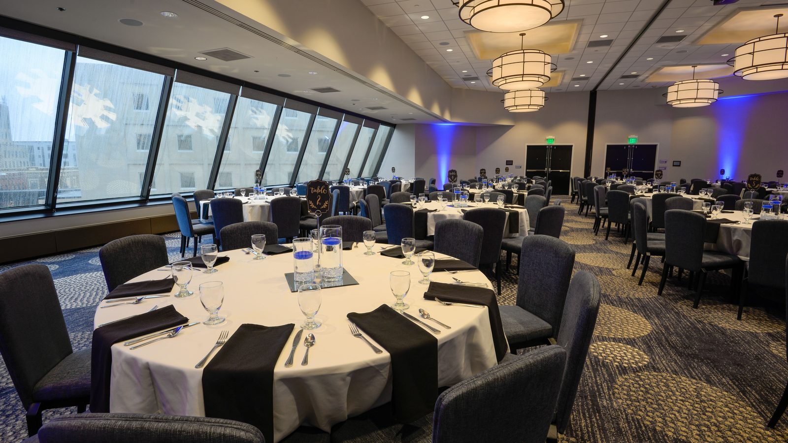 An elegant banquet room set for an event